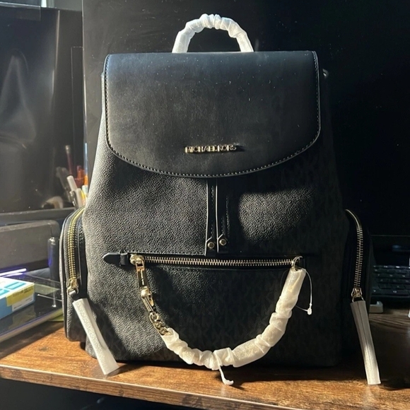 Michael Kors Handbags - Black Backpack with Gold Accents
